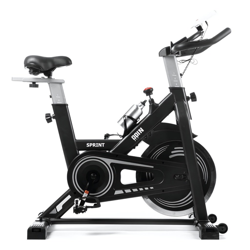 Bicicleta de spinning Odin Fit 13kg para treino indoor.